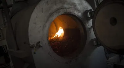 The refining furnace glowing during processing